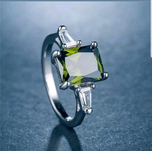 Brand new sterling silver stamped peridot ring